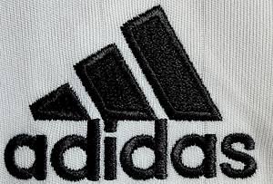 match worn football shirt DFB 200 - Original match-worn DFB player shirt, number 20, belonging to Lukas Podolski. Worn during the warm-up match against FSV Luckenwalde on May 16, 2006. What makes this shirt particularly special is the fact that the sponsor at the time—"Mercedes-Benz"—was also printed onto the shirt. Status: AAB. Short-sleeved jersey; Size XL; Embroidered club crest; Embroidered Adidas manufacturer logo; Rubberized sponsor print, player number, and player name; 100% Polyester; Made in China. Condition: A - Bild 6