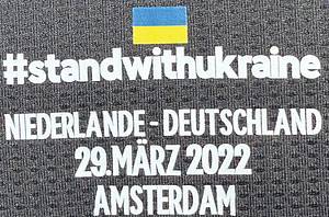  - Original match-issued DFB player jersey with the number 9. Worn by Timo Werner in the friendly match against the Netherlands on March 29, 2022, in Amsterdam. The jersey features the special "Stand with Ukraine" print to show solidarity with Ukraine. Condition: AAB. Short-sleeved jersey; size 6; DFB logo, rubberized Adidas logo, match details, rubberized player number and name; rubberized peace patch; Adidas HEAT.RDY; 100% polyester; made in Cambodia; shirt comes from the collection of an German FA employee Condition: A - Bild 5