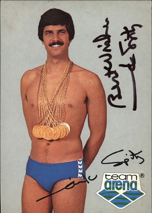 Autograph Olympia 1972 swimming. Mark Spitz - Colour autograph card "team arena" with both the faksimile signature and the original signature of swimmer Mark Spitz (*1950). Spitz is the eleven time gold medallist (siven times at the  Olympic Games in Munich 1972) and 34 time US Americaan record holder. 14,8x10,5 cm. Condition: A-B