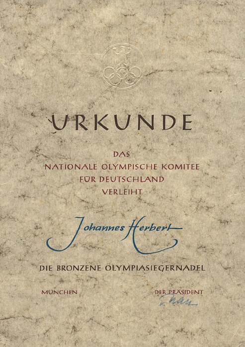  - Olympic Games Berlin 1936 German Diploma: The NOC presents the golden pin to Johannes Herbert German Bronzemedal winner from Berlin 1936. With original signature of NOC president Karl von halt and blind embossed pin. 29.5x51 cm. From 1952 the NOC presented winner pins in gold, silver and bronze to German medallists. They also decided to present German winners of the Olympic Games 1936 with such pins since the medals contained swastikas which have been forbidden to wear after 1945. Condition: A
