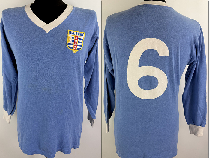 Ricardo Pavoni - Shirt Uruguay 1974 - Original match-worn Uruguay player shirt, number 6 (Ricardo Pavoni). Worn in the match against FC Basel on June 8, 1974. The shirt comes from the collection of the Swiss international Karl Odermatt and was previously an exhibit in a Swiss sports museum. Status:AAA. Long-sleeved shirt; size M; manufacturer Erima; sewn-on federation emblem and back number; 100% cotton. Condition: A