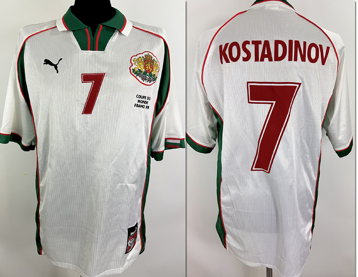  - Original match-worn Bulgaria player shirt, number 7 (Emil Kostadinov). Worn during a match at the 1998 World Cup in France. Status: ABB. Short-sleeved shirt; size L; stitched federation crest; flocked Puma logo; flocked player name and number; flocked match details; 100% polyester. --from the collection of a former DFB (German Football Association) staff member. Condition: A-