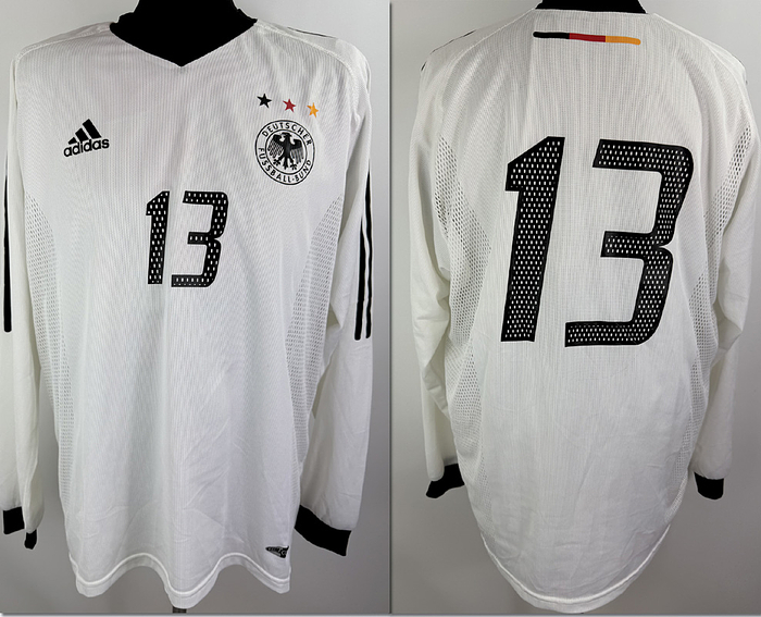  - Original match-worn DFB player shirt, number 13 (Michael Ballack). Worn in an international match during the 2002/2003 season. The shirt comes from the collection of a former DFB staff member. Status:ABB. Long-sleeved shirt; size XL; heat-applied DFB logo and Adidas manufacturer logo; heat-applied player number; Adidas Climacool with integrated inner shirt; 100% polyester; made in Tunisia; Condition: A