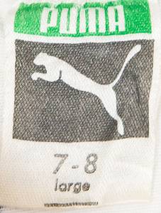  - Original match-worn Austria playershirt, number 11, belonging to Jürgen Werner. Worn during the international match against Germany on October 29, 1986, in Vienna. This jersey was obtained via a shirt swap with German international and 1990 World Cup champion Rudi Völler. The jersey comes from the personal circle of Rudi Völler’s family. Status: AAA. --Long-sleeved jersey; size 7–8; federation emblem stitched on, manufacturer’s logo (Puma) applied as a rubberized print; player number applied as a rubberized print; 70% polyamide, 30% triacetate; made in West Germany. Condition: A- - Bild 5