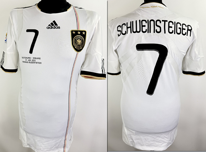  - Original match worn / issued DFB player jersey, number 7, belonging to Bastian Schweinsteiger. Prepared for the 2010 World Cup Round of 16 match between Germany and England on June 27, 2010, in Mangaung/Bloemfontein, South Africa—a game the German national team won 4–1. Status AAB. Short-sleeved jersey; size L; DFB logo applied as a decal; Adidas manufacturer logo, match details, player number, and player name applied as rubberized prints; 2010 World Cup patch applied via flocking; Adidas Techfit; 100% polyester; made in Thailand. --The jersey comes from the collection of a former DFB official. Condition: A