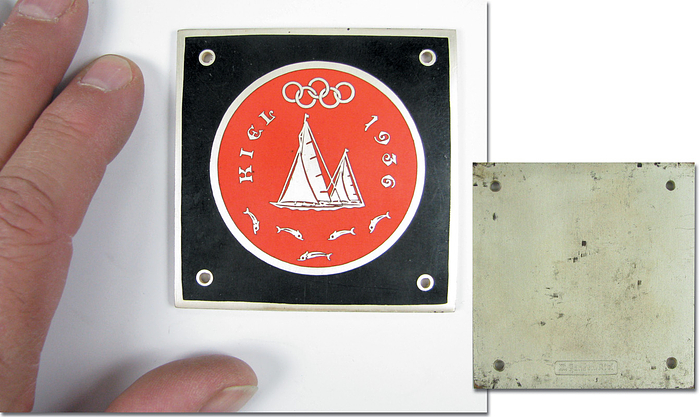  - Olympic Games 1936. Car plaque Kiel Sailing compe: „Kiel 1936“ Olympic Sailing regatta 1936 Bronze, silver plated, MC enamelled. Produced by M.Hansen, Kiel. 6.8 x 6.8 cm. Very rare! EF Condition: A