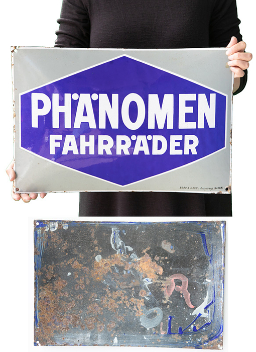 Emailschild - Radsport  | Original Emailschild "Phänomen Fahrräder" der Phänomenfahrradwerke Gustav Hiller. Metallschild, farbig emailliert. Hersteller: Boos & Hahn, Ortenberg (Baden).49x34 cm. Ca. 1925