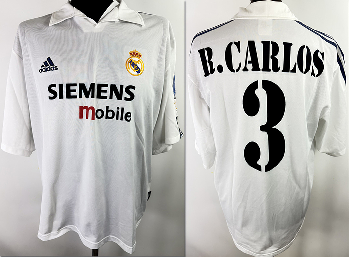 match worn football shirt real madrid 2003 - Original match-worn Real Madrid player shirt, number 3. Worn by Roberto Carlos in a Champions League match during the 2002/2003 season. The shirt comes from the collection of a former DFB staff member. Shirt details: short-sleeved; size L; Real Madrid crest and Adidas manufacturer logo applied (rubberized); "Siemens" sponsor logo laser-printed; Champions League logo stitched on; 100% polyester. Condition: A