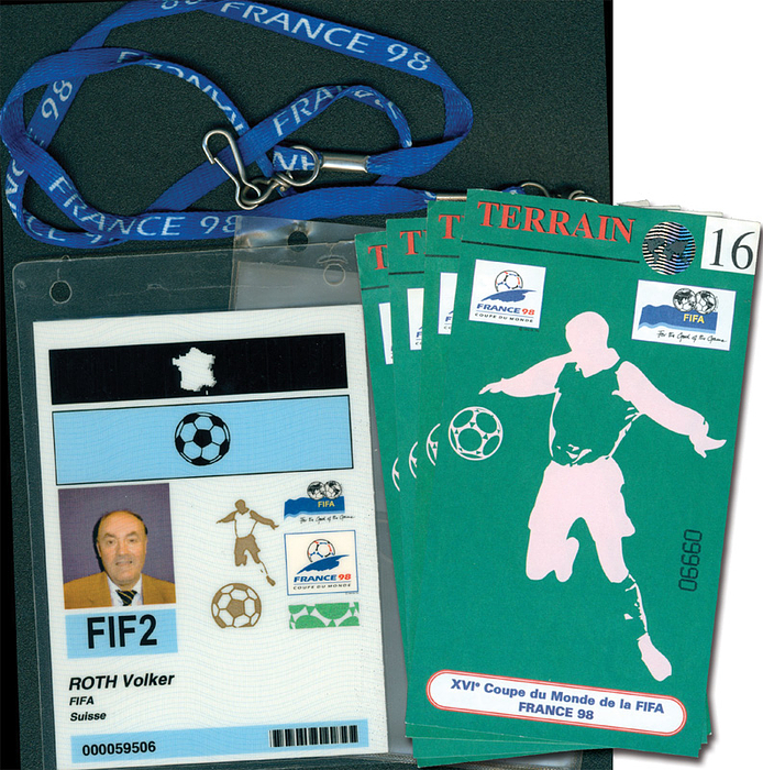  - Official participant ID card from the 1998 FIFA World Cup for FIFA match observer Volker Roth (1942–2025; GER), featuring a photograph and silk lanyard. 15 x 11 cm. Included: 4 access passes for matches 1, 16, 45, and 64, granting access to the pitch or inner area; paper, 15.5 x 8.5 cm each. --The pieces come directly from the estate of Volker Roth. Condition: A