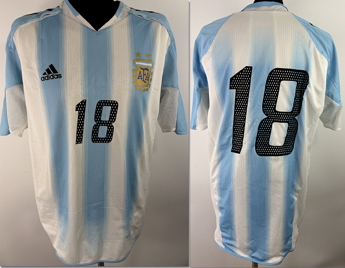 match issued football shirt Argentina 2005 - Original match-issued Argentina player shirt, number 18, belonging to Lionel Messi. Prepared for the international match against Hungary in Budapest on August 17, 2005. Status AAB. Short-sleeved shirt; heat-applied team crest and Adidas manufacturer logo; heat-applied player number; integrated inner shirt; made in Thailand; 100% polyester. Condition: A