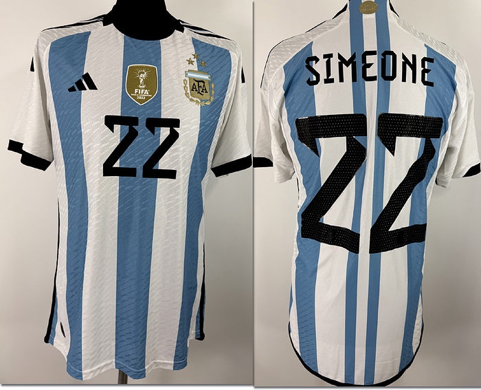  - Original match-issued Argentina player shirt, number 22 (Giuliano Simeone). Prepared for an international match during the 2024–2025 season. Argentina won the 2022 World Cup in Qatar. Shirt details: short-sleeved; size M; heat-applied team crest and manufacturer logo; heat-applied player name and number; applied "World Champions 2022" patch; 100% polyester; made in Argentina. Condition: A