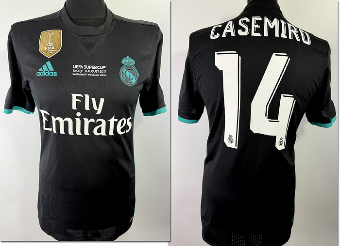  - Original match-issued Real Madrid player shirt, number 14 (Casemiro). Prepared for the UEFA Super Cup final against Manchester United on August 8, 2017, in Skopje. Casemiro scored the opening goal; the final score was 2–1. Real Madrid became the first team since AC Milan in 1990 to win the UEFA Super Cup twice in a row. Status AAC. Short-sleeved shirt; size 6; heat-applied club crest; heat-applied Adidas logo; heat-applied chest sponsor, player name, and number; heat-applied match details; flocked CL, Trophy, and Respect patches; 100% polyester; made in Vietnam. Condition: A