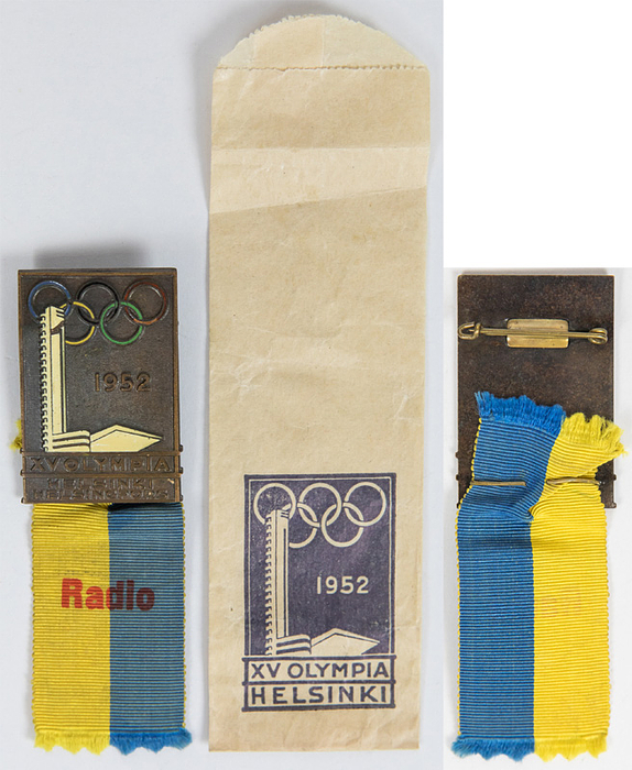 Teilnehmerabzeichen 1952  | Teilnehmerabzeichen „Radio" Bronze, mehrfarbig emailliert, mit schwarz gelb bedrucktem Seidenband, 11,5x3,3 cm. Dabei: original Papierverpackung
