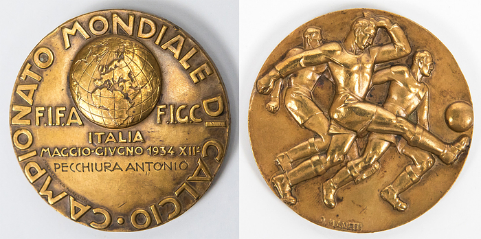 FIFA World Cup 1934. Participation Medal - Official participation medal players, Referees and officials for the Football World Cup in Italy 1934 with inscription "Campionato Mondiale di Calcio. FIFA FIGC Italia Maggio - Givgno 1934 XIIe" with engraved name "Pecchiura Antonio". Designed by "D.Manetti". Bronze, 5 cm. --Antonio Pecchiura (1902-deceased) was a well-known first division referee in Italy and officiated 122 Seria A matches. He refereed his first A league match in November 1934. At the time of the 1934 World Cup, he was a member of the refereeing staff and received this medal for his participation in the 1934 FIFA World Cup. Condition: A