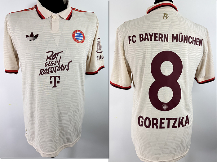  - Original match-issued FC Bayern player shirt, number 8, belonging to Leon Goretzka. Prepared for the match against St. Pauli on March 29, 2025. To mark the International Weeks Against Racism, FC Bayern wore the slogan "Rot gegen Rassismus" (Red Against Racism) on the shirt for this match instead of their usual main sponsor, "Telekom." Status:AAB. Short-sleeved shirt; size 6; club crest and Adidas manufacturer logo applied (heat-pressed); club name, player number, and player name applied (heat-pressed); back number 25 cm high; Bundesliga patch and Allianz patch applied (heat-pressed); 100% polyester; made in Cambodia. --The jersey comes from a Bayern Munich staff member. Condition: A