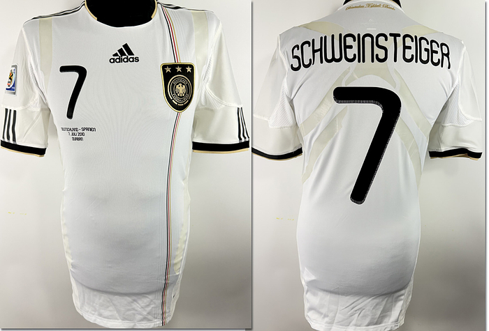  - Original match-issued DFB player shirt (number 7) belonging to Bastian Schweinsteiger. Prepared for the 2010 World Cup semi-final between Germany and Spain on July 7, 2010, in Durban, South Africa—a match won 1–0 by the Spanish national team. Status AAB. Short-sleeved shirt; size L; DFB logo applied (adhesive); Adidas manufacturer logo, match details, player number, and player name applied (rubberized); 2010 World Cup patch applied (flock); Adidas Techfit; 100% polyester; made in Thailand. --Comes from the collection of a former DFB official Condition: A