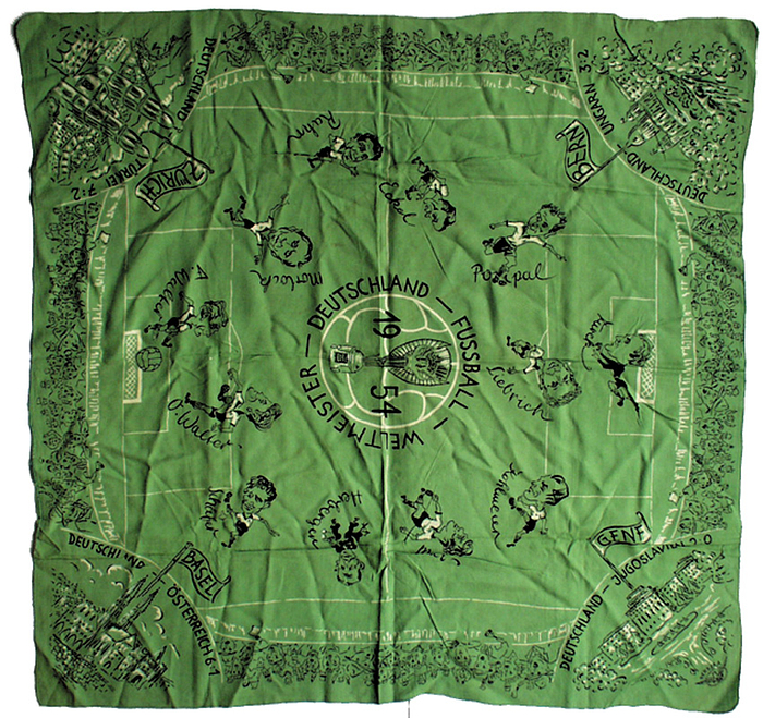  - World Cup 1954. Large Satin Cloth with drawings: Large light green satin cloth made by Berbera. Showing the German players as caricatures, the results and places where German matches were played. Fine decorative item! Size 67x64 cm. With some spots Condition: B