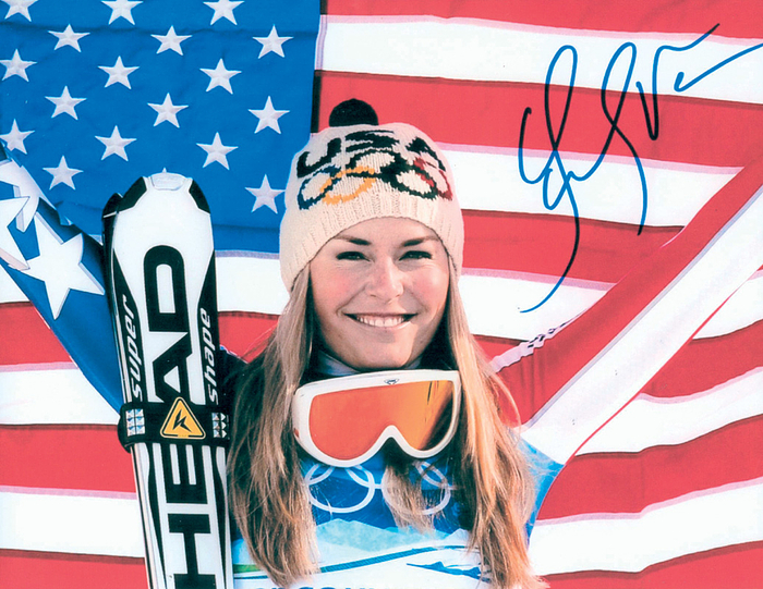 Vonn, Lindsey  | Großer Farbfotoprint mit original Signatur von Lindsay Vonn (USA). Mehrfachen Weltmeisterin und Olympiasiegerin im Ski-Alpin. 25,5x20 cm. Mit COA von "Signedpictures" auf der Rückseite.