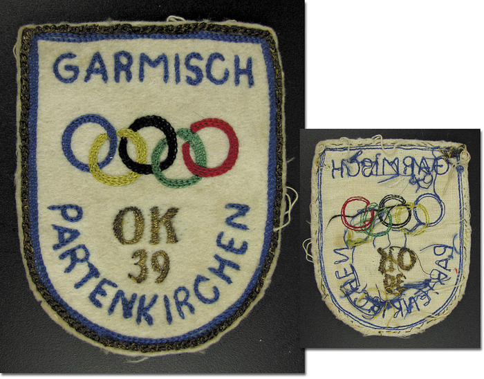 Olympic Games 1936 Official Patch Jury - Official linen badge from the Olympic Games 1936 with embroiderd colour Olympic Rings and inscription  "Kampfgericht 142" (judges). 13 x 13 cm. Condition: A