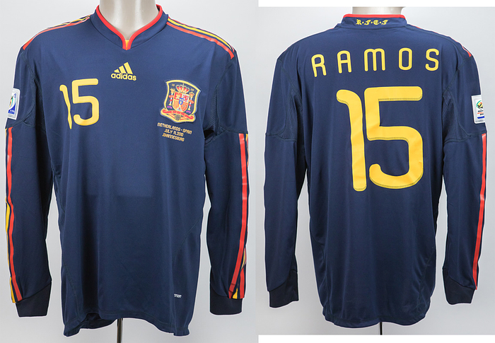 World Cup 2010 match worn football shirt Spain - Original match issued shirt Spain with number 15. Prepared for Sergio Ramos in the World Cup final against the Netherlands on 11 July 2010. Netherlands - Spain 0:1 a.e.t. Ramos was World Champion with Spain in 2010. Status: AAB. Long sleeved shirt; size L; embroidered FA emblem; gummed adidas emblem and match details; gummed number (front and rear);  embroidered inscription "R.F.E.F" on collar; mesh in armpit areas; FIFA World Cup South Africa 2010 patch; adidas formotion climacool. Shirt comes from the collection of a former DFB staff member who got it from a Spanish member of staff during the World Cup 2010. Condition: A