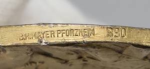 Olympic Games Berlin 1936 Gold Winner medal - Gold winner's medal "11th Berlin Olympics 1936" by Ernst Ihbe (1913-1992; GER) for first place in the 2000 m tandem sprint with Carl Lorenz. Punched on the edge with the manufacturer's mark "B.H. Mayer, Pforzheim 990." Silver (hallmarked 990, weight: 74 grams), gold-plated, 5.5 cm in the original leather case with embossed lid. --Medal (Condition: A-B) slightly tarnished; small dents on the edge and traces of gold testing. (The medal of Carl Lorenz (1913-1993), which AGON sold around 1995, showed similar marks. Both athletes evidently believed this medal to be made of solid gold and were visibly disappointed. Both medals have dents. Note: W. Fuhr, Expert AGON.) Case heavily rubbed; gold embossing no longer present (Condition: C). The consignor received this medal directly from the estate of Ernst Ihbe approximately 25 years ago. Condition:  - Bild 7