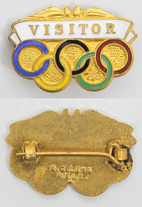 Olymic Games Melbourne 1956. Commemorative Pin - Souvenir badge from the 1956 Summer Olympics with color-enamelled Olympic rings and the inscription "Visitor." Gold-plated bronze, partially color-enamelled, manufacturer: "G.C. Luke, Melbourne," 2.5 x 1.8 cm Condition: A