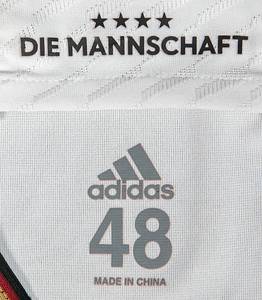 match worn football shirt Germany 2022/2023 - Original match-worn / issued Germany shirt with the number 10. Worn by Serge Gnabry on September 23, 2022, in the Nations League group match against Hungary. Germany - Hungary 0:1. Status: AAB --Short-sleeved jersey; size 48; DFB logo, 4 World Cup stars, and adidas logo rubberized; player name and number (front and back) rubberized; 'Deutschland' lettering on the back of the collar and 'Die Mannschaft' lettering on the inside of the collar rubberized; jersey has signs of wear (stains); with Nations League logo patch and UEFA Foundation for Children patch; adidas Heat.Rdy. Jersey comes from a DFB employee Condition: A- - Bild 9