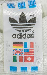 UEFA EURO 1988 football shirt Germany match worn - Original match-worn Germany shirt with the number 14. Worn by Thomas Berthold on June 10, 1988, in the opening match of the European Championship against Italy. Italy - Germany 1:1. Berthold is a 1990 World Cup winner and 1986 World Cup runner-up. Status: AAA --Short-sleeved jersey; size 7/8; DFB logo (with tongue on the eagle), embroidered; adidas logo printed; flocked back number; jersey has minor signs of wear; adidas. The consignor has acquired this jersey directly from the collection of Thomas Berthold. Condition: A- - Bild 6