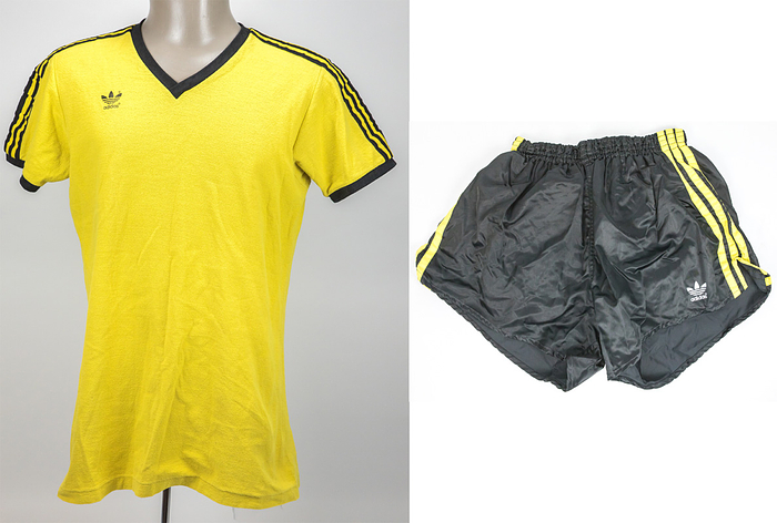 Match worn Footballshirt Borussia Dortmund 1968 - Original match-issued Borussia Dortmund player jersey without a number. Designed for the 1972-1976 Bundesliga season, it comes with the matching Borussia shorts. Status: ACA --Yellow short-sleeved cotton jersey with terry cloth. Thinly flocked Adidas logo. Sewn-on black and yellow Adidas stripes. Size 7/8. Black shorts with black and yellow sewn-on Adidas stripes. Size 7. Printed Adidas logo. --Jersey comes directly from the Werner Weist collection (1949-2019) - Borussia Dortmund 1968-1971 (72/34), Werder Bremen 1971-1977 (145/33), Stuttgarter Kickers (1977-1978; 10/1); 3x DFB U-23 1970 + 1971). The buyer will receive a certificate of authenticity and confirmation from the Weist family regarding the origin of the items. Condition: B