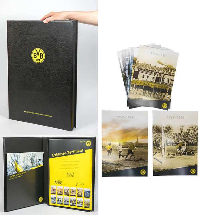 "BVB Borussia Dortmund. Unser ganzer Stolz. Die BVB-Historie als Faksimile". 12 Mappen mit großfornatigen historischen Fotos von Borussa Dortmund 1909 bis 2013. In einer Kunstlederkassette mit aufgesetztem Logo des BVB.  62x43,5x8 cm. Gewicht: 10,4 kg. Nummeriertes Exemplar "1505" der limitierten Auflage von 1904 Exemplaren. Mit original Signaturen von Joachim Watzke und reinhard Rauball.