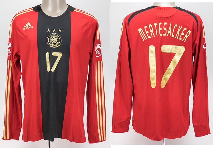match issued football shirt Germany 2008 - Original match-issued Germany player jersey with the number 17. Designed for Per Mertesacker on May 27, 2008, in a friendly against Belarus. Germany - Belarus 2:2. Mertesacker played in a short-sleeved jersey and is a 2014 FIFA World Cup winner. Status: ABB --Long-sleeved jersey; size L; embroidered association logo and three World Cup stars; rubberized adidas logo, back number, and player name; mesh insert; with adidas patches; adidas formotion clima365. Comes from the collection of a DFB employee. Condition: A