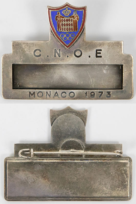 Teilnehmer-Abzeichen der IOC Session Monaco 1973. Aufschrift "C.N.O.E Monaco 1973". Leichtmetall, mehrfarbig emailliert. 5x3,8 cm.