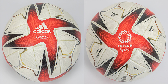 Original Adidas "Conext 21" Spielball von den Olympischen Spielen Tokyo 2020 vom Finale des Fußballturniers der Frauen Kanada v Schweden (1:1 n.V.; 3:2 i.E.)) am 6.8.2020 in Yokohama (International Stadium). Mit Aufdruck der match Details "8 August 2020 Women´s Final Yokohama - International Stadium Yokohama" außerdem "Official Match Ball". Mit geringen Spielspuren.