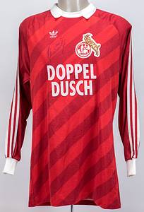 Original match worn Torwart-Trikot vom 1. FC Köln SV mit der Rückennummer 1. Getragen von Harald 'Toni' Schumacher in Spielen der Bundesliga-Saison 1984/85. Schumacher wurde mit der deutschen Nationalmannschaft Europameister 1980 und zweimal Vize-Weltmeister. Mit original Signatur. Status:ABA. - Bild 2