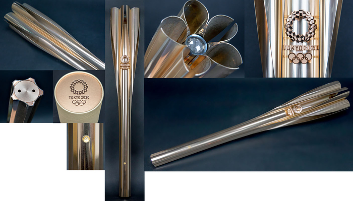 Original Olympiafackel von den Olympischen Spielen Tokyo 2020. Kirschblütenrosafarbenes Aluminium. Mit dem Logo der Olympischen Spiele 2020. Länge: 71 cm. In original Box.