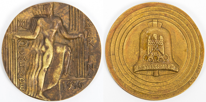 Teilnehmermedaille 1936  | Offizielle Teilnehmermedaille für die Olympischen Sommerspiele von Berlin 1936 (v. Otto Placek). Mit Randpunze "Guss. H.Noack Berlin" Bronzeguß brauner Patina. 7 cm.