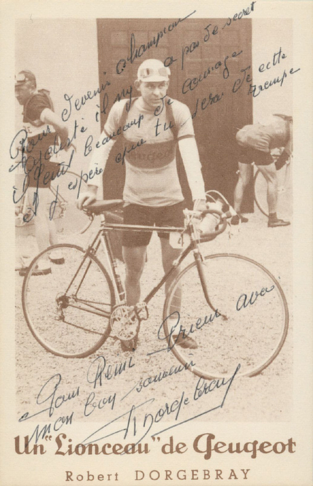 Dorgebray, Robert  | (1915-2005) s/w-Autogrammkarte mit Originalsignatur und Widmung von Robert Dorgebray. Französischer Radrennfahrer. Gold bei den Olympischen Spielen 1936 in der Mannschaftswertung des Straßenrennens. 13,9x9 cm.