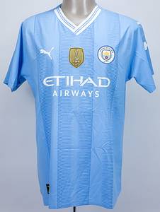  - Original match-worn Manchester City shirt with the number 9. Worn by Erling Haaland in an English Premier League match during the 2023/2024 season. Haaland has been capped 43 times by Norway. The shirt features the Intercontinental Cup winners badge. Status: ABC  --Short-sleeved jersey; size XL; club emblem and FIFA World Champions 2023 badge. Rubberized Puma logos; rubberized 'Eti-Had Airways' advertising print; rubberized back number and player name; rubberized 'City' lettering on the back of the collar; with Premier League logo patch and No Room for Racism patch; Puma UltraWeave. Condition: A - Bild 2