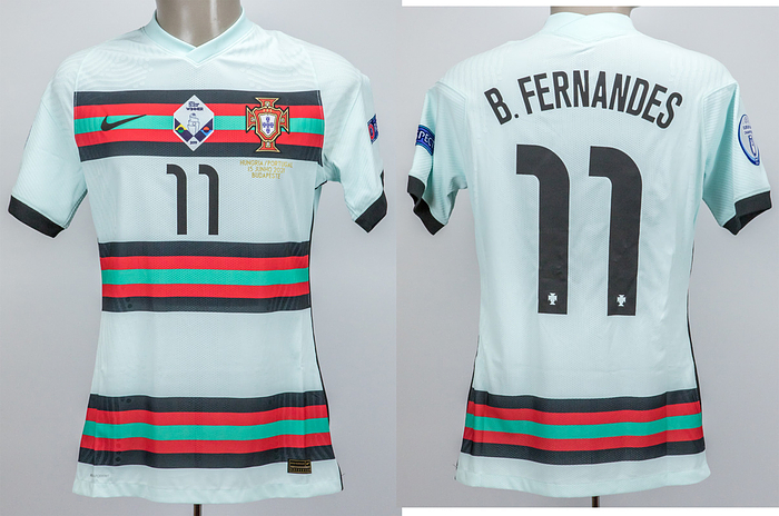  - Original match-worn/issued Portugal shirt with the number 11. Worn by Bruno Fernandes on June 15, 2021, in the UEFA European Championship group match against Hungary. Hungary lost 0-3 to Portugal. Fernandes is a 2019 and 2025 UEFA Nations League winner. Status: AAC --Short-sleeved jersey; size M; federation logo, UEFA Nations League Winner 2019 badge and Nike logo stitched; match details, player name and number (front and back) rubberised; jersey with UEFA Europaen Champions 2016 patch and UEFA Respect patch; Nike Varporknit. Condition: A