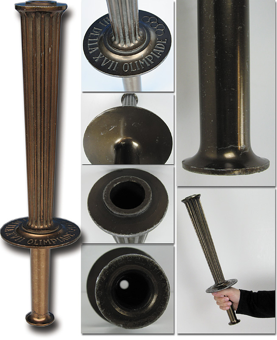 Olympic games Rome 1960. Official Olympic Torch - Olympic Games Rome 1960:0 Official Olympic torch in bronzed aluminium with embossd  lettering "Giochi della XVII Olimpiade" and Olympic rings on the protective plate above the hand grip. Original Torch with signs of usage, otherwise in excellent condition. Height 39.5cm, manufactured by  M.F. Curtisa/Bologna". With signs of wear. Condition: B