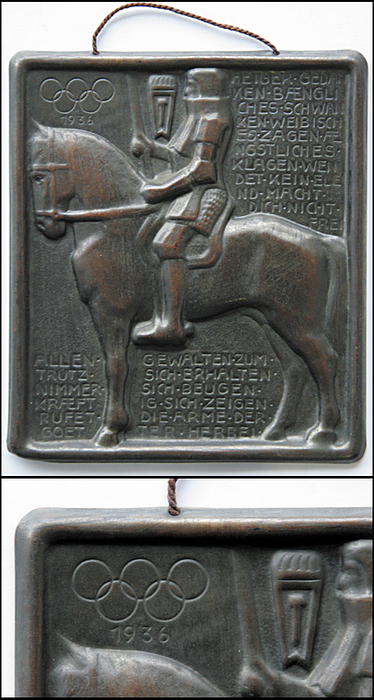  - Olympic Games 1936. Hollow-stamped, bronzed metal plaque from the Wagner company commemorating its 400th anniversary in 1936, the year of the Olympic Games. Featuring Olympic rings and the year "1936". Inscription based on a quote from Goethe. 19.5 x 17.5 cm Condition: A