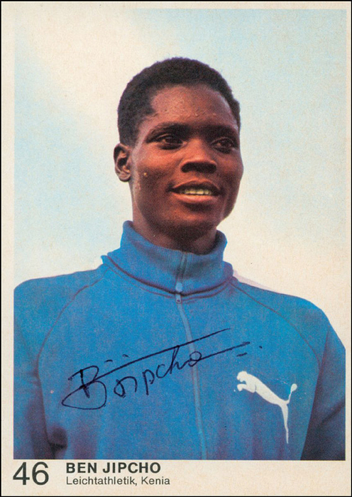 Jipcho, Ben  | (1943-2020) Farbiges Bergmann - Sammelbild (München 72) mit Originalsignatur von Benjamin Jipcho (KEN). Silbermedaillen-Gewinner bei den Olympischen Spiele 1972 im 3000 m Hindernislauf, 10.5x7 cm.