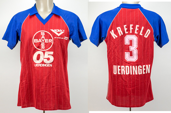match worn football shirt Bayer Uerdingen 19984 - Original match worn shirt FC Bayer 05 Uerdingen with number 11. Worn in a  bundesliga match between 1984 and 1987. Status: ACC. Long sleeved shirt; size 5/6; flocked club emblem; printed adidas emblem; gummed number and inscription "Krefeld Uerdingen". Shirt shows signs of usage (small stain on Bayer inscription); adidas. Condition: A-