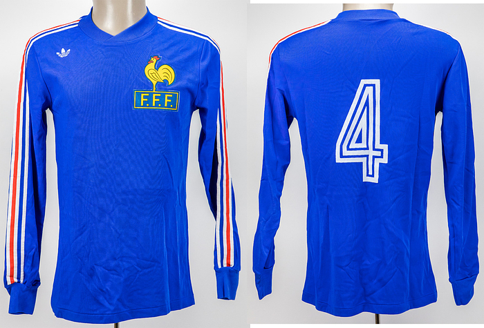  - Original match-worn French national team jersey with the number 4. Worn in a 1977 U-20 World Cup match against Spain by French international Michel Bibard. Condition: AAA. Includes: Photo of Bibard wearing this jersey! --Long-sleeved jersey; iron-on federation logo sewn on; flocked adidas logo (plastic); flocked back number; adidas Ultron "Made in France"; -The consignor obtained this jersey directly from Bibard's collection Condition: B+