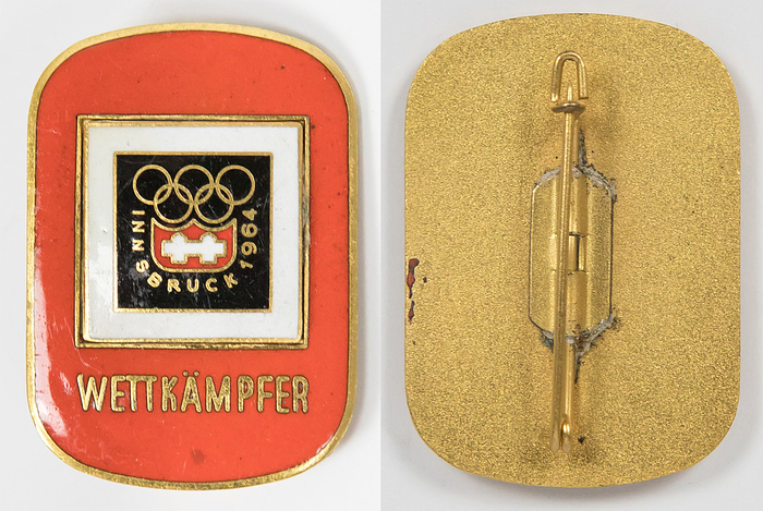 Participation badge:Olympic Games 1964 Athlets - Participation badge Olympic Games 1964 Athletes. Bronze, with coloured enamel, red background, Olympic Emblem and the word „Wettkämpfer“ (Athlet). Size 3x4.2 cm, Condition: A