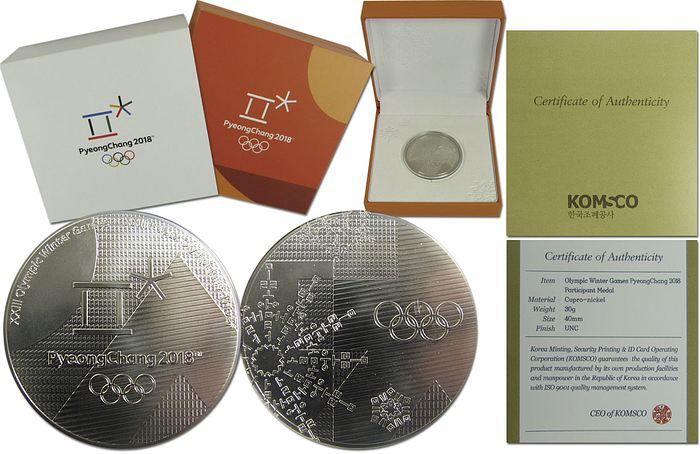  - Olympic Winter Games 2018: Official participation medal for athletes from the Olympic Winter Games in PyeongChang 2018 inscribed "XXIII Olympic Winter Games PyeongChang 2018",brass-nickel (30 grammes), 4 cm. In original plastic sphere in a cardboard box which is covered with white embossed velvet. Plus original white slipcase with colour inscription  "PyeongChang 2018" Plus a certificate of authenticity which confirms this medal as a participation medal. This medal was presented only to athletes at the Olympic Winter Games in PyeongChang 2018. Extremly rare, extra fine. Condition: A
