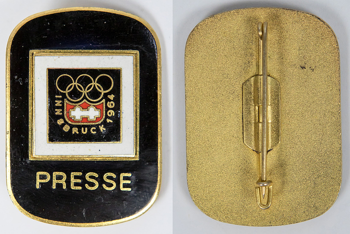 Teilnehmerabzeichen 1964  | Teilnehmerabzeichen Innsbruck 1964 „PRESSE“. Bronze, vergoldet, mehrfarbig emailliert. 3x4,2 cm.