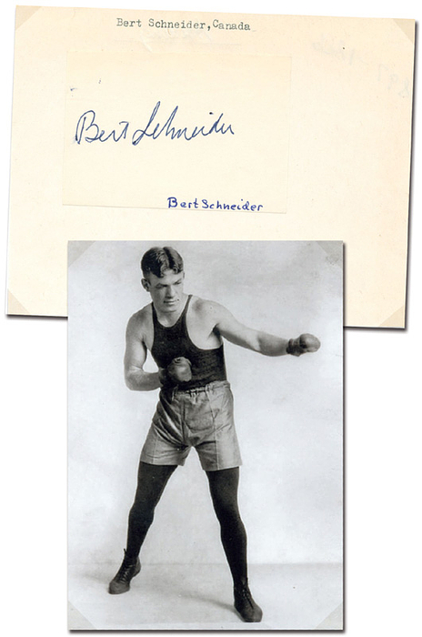 Schneider, Albert "Bert"  | (1897-1986) Blancobeleg (7x5 cm) mit original Signatur von Albert "Bert" Schneider (CAN). Goldmedaille im Boxen Weltergewicht bei den Olympischen Spielen 1920. Aufgeklebt auf Papier, 13,5x10,5 cm.