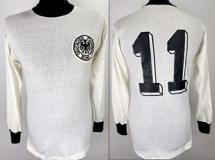 match worn football shirt germany 1974 - Original match-worn Germany player shirt with the number 11. Worn by Jupp Heynckes in a match during the 1974 World Cup in Germany. The shirt comes from the collection of a former DFB (German Football Association) staff member. Status ABB jersey; long-sleeved; size M; DFB crest embroidered; rubberized player number; 100% cotton; made in West Germany. Condition: A