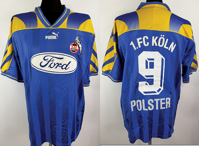  - Original match-worn 1. FC Köln player shirt with the number 9. Worn in a Bundesliga match by Toni Polster in the 1996/1997 season. Short-sleeved shirt; size XL, club emblem, chest sponsor, club name embossed/foamed; player number and name flocked; manufacturer logo "Puma" foamed on; 100% polyester; Made in Hungary; Status:ABC Condition: A-